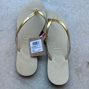 Havaianas gold sand metallic flip flops in size 41-42. New